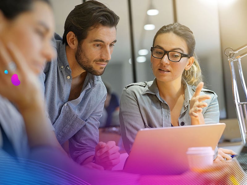 Colleagues workshopping business ideas in modern co working space